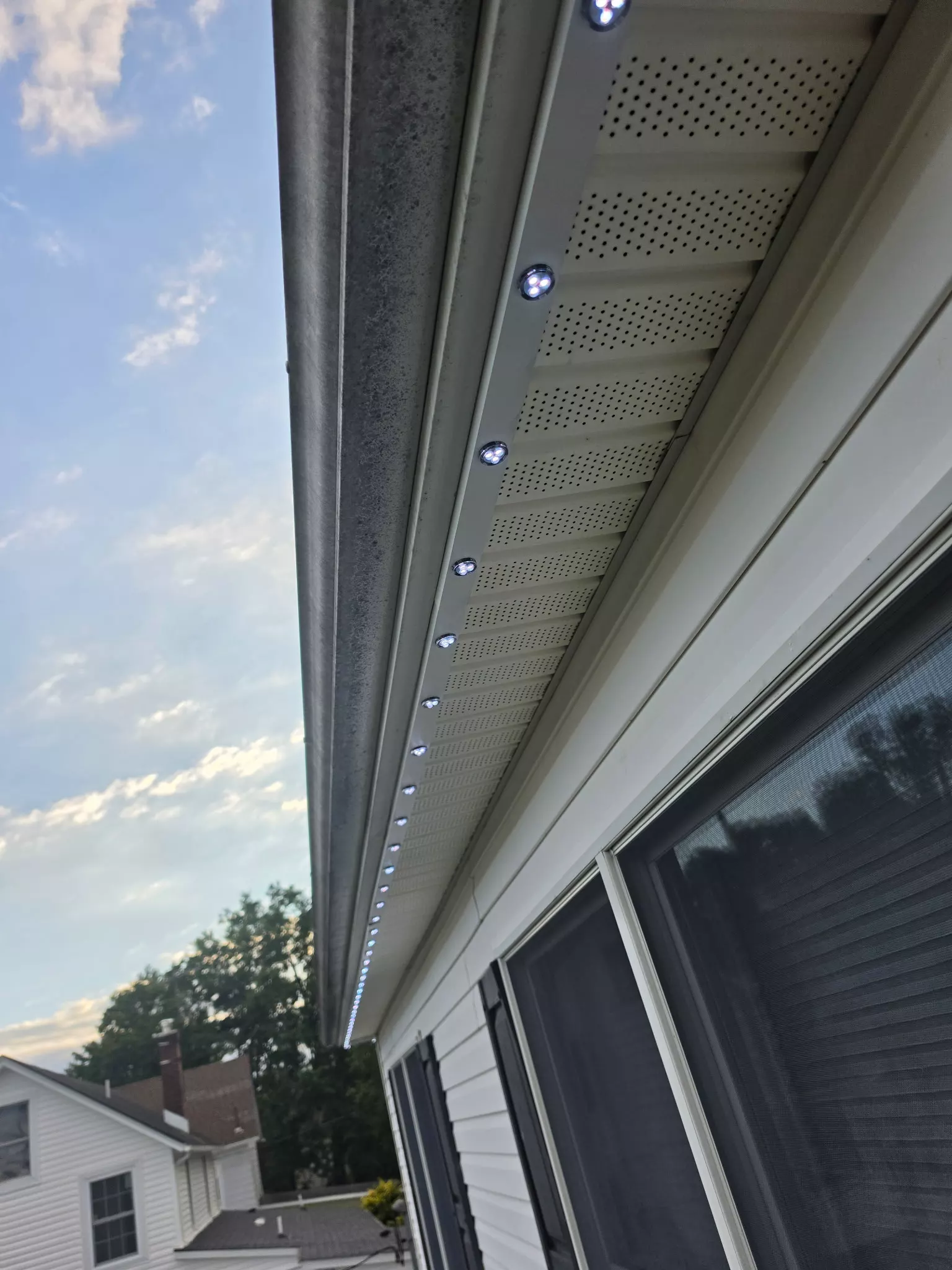 Track running along a white eave