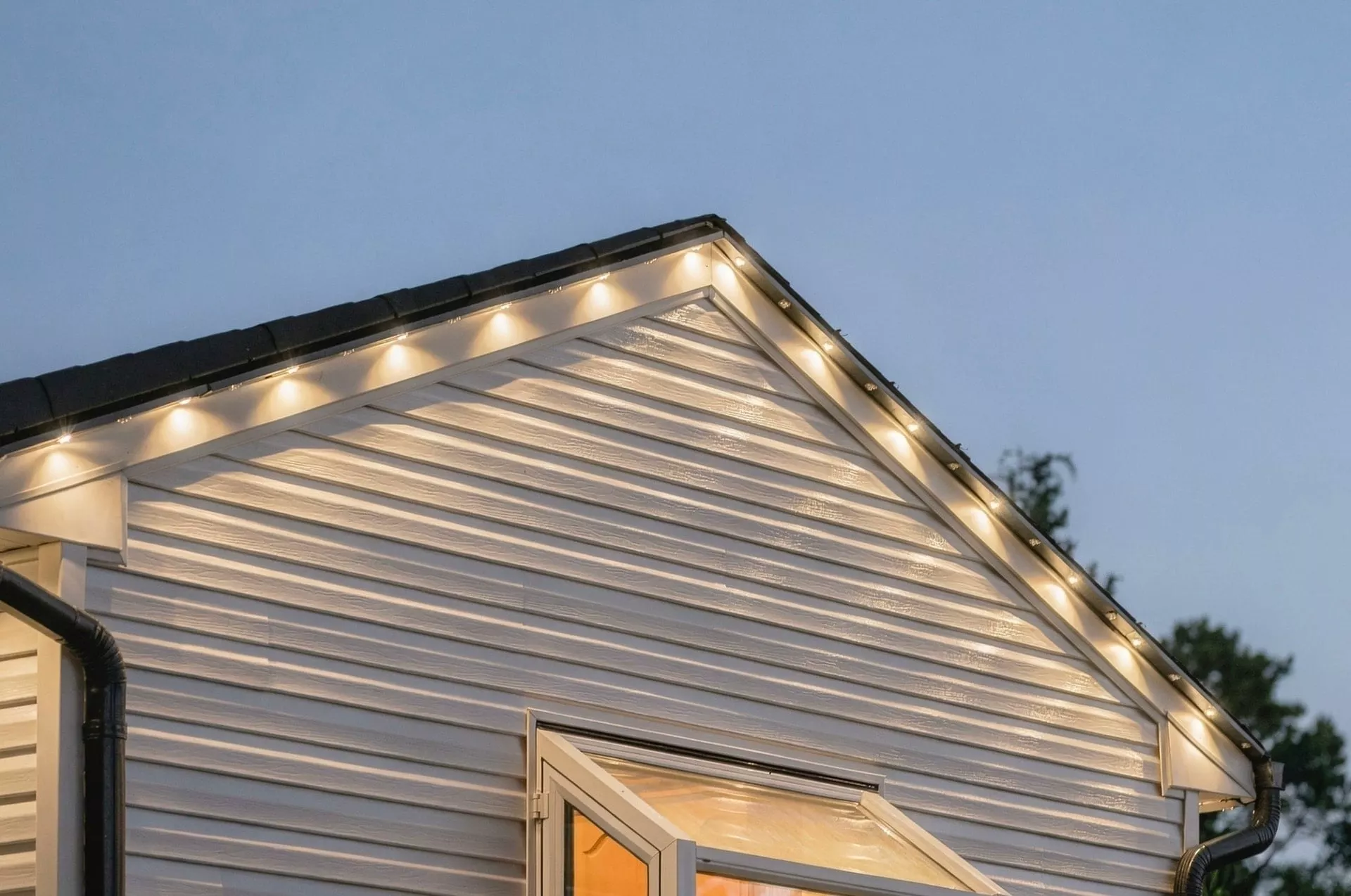 Gable with evenly spaced warm white lights